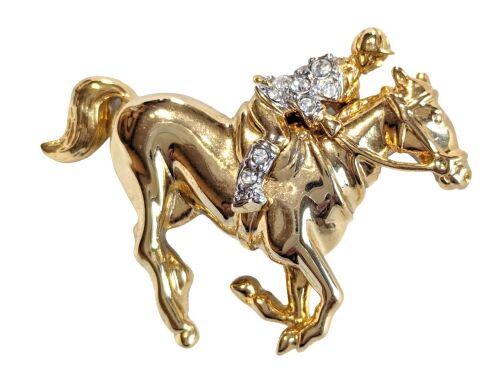 Vintage Cabouchon brooch with a galloping horse