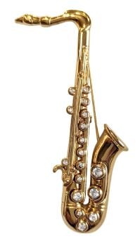 Vintage Cabouchon gold plated saxophone brooch with Austrian crystals.