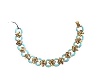 Vintage Cabouchon bracelet with gold plating and light blue enamel. Size medium.
