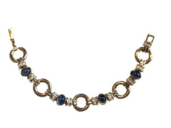 Vintage Cabouchon bracelet with gold plating, blue diamantés and Austrian crystals. Size medium.