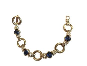 Vintage Cabouchon bracelet with gold plating, blue diamantés and Austrian crystals. Size medium.