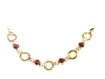 Vintage Cabouchon bracelet with gold plating, red stones and Austrian crystals, size medium.