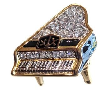 Vintage Cabouchon gold plated piano brooch with Austrian crystals and black enamel.