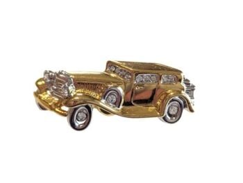 Vintage Cabouchon gold and rhodium plated car brooch with Austrian crystals.