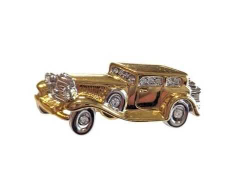 Vintage Cabouchon gold and rhodium plated car brooch with rhinestones