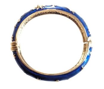 This is a beautiful vintage bangle from the Cabouchon Astrology collection. Size medium.