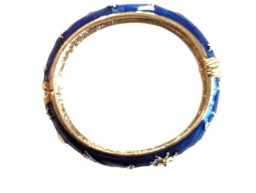 This is a beautiful vintage bangle from the Cabouchon Astrology collection