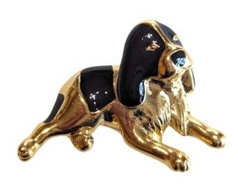 Vintage Cabouchon gold plated tac-pin with black enamel depicting a lying down dog