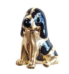 Vintage Cabouchon gold plated tac-pin with black enamel depicting a sitting dog