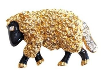 Vintage Cabouchon gold plated brooch with black enamel and Austrian crystals depicting a ram