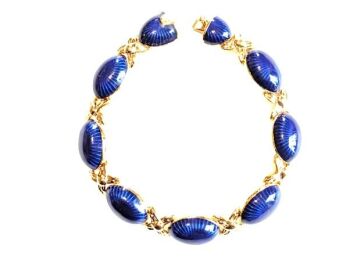 Vintage Cabouchon bracelet with gold plating and blue stones.  Size large.