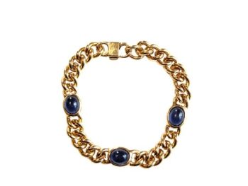 Vintage Cabouchon bracelet with gold plating and 3 blue stones.  Size extra large.