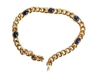 Vintage Cabouchon bracelet with gold plating and 5 blue stones.  Size extra large.