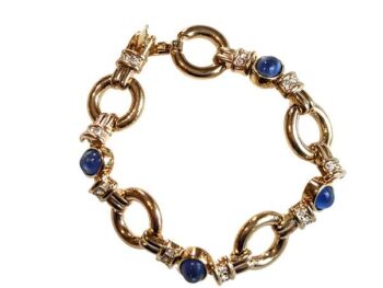 Vintage Cabouchon bracelet with gold plating, blue diamantés and Austrian crystals.  Size medium.