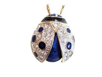 Vintage Cabouchon ladybird brooch  with gold plating, blue enamel and Austrian crystals