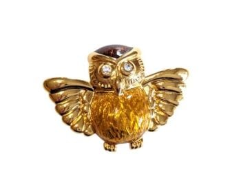 Vintage Cabouchon  brooch depicting an owl with gold plating and brown and light brown enamel. The eyes are with Austrian crystals.