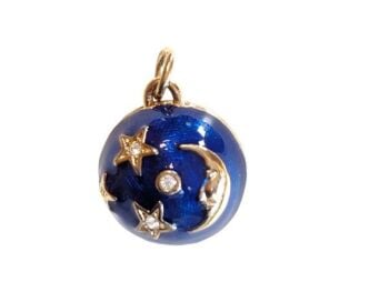 Vintage Cabouchon gold plated pendant from the Astrology collection with blue enamel  and Austrian crystals