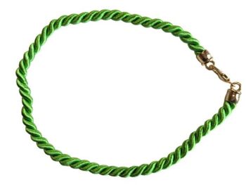 Vintage Cabouchon light green cord necklace with a gold plated clasp. Size medium.