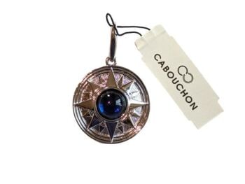 Vintage Cabouchon rhodium plated pendant with a blue stone