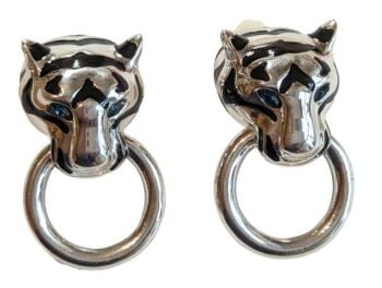 Vintage Cabouchon rhodium plated clip earrings from the Tiger collection with black enamel. The eyes are blue.