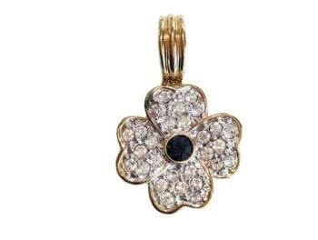 Vintage Cabouchon gold plated pendant  with a sapphire coloured blue stone and rhinestones