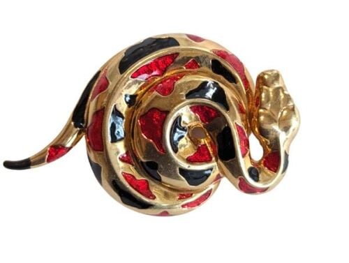 Vintage Cabouchon  snake brooch with gold plating and red and black enamel.