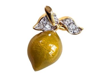 Vintage Cabouchon  lemon tac-pin with yellowish-greenish enamel and Austrian crystals. The back is gold plated.