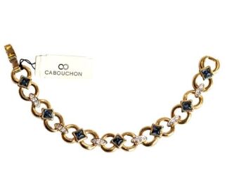Vintage Cabouchon gold plated bracelet with high blue diamantés and Austrian crystals.  Size medium.