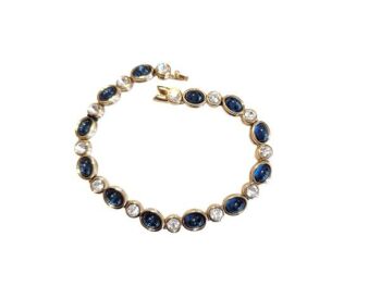 Vintage Cabouchon gold plated bracelet with sapphire coloured blue stones and Austrian crystals.  Size large.