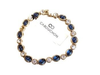 Vintage Cabouchon gold plated bracelet with sapphire coloured blue stones and Austrian crystals. Size medium.