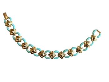 Vintage Cabouchon bracelet with gold plating and  light green enamel.  Size medium.