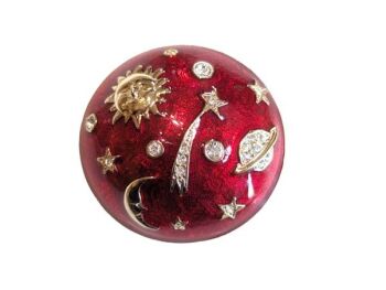 Vintage Cabouchon brooch from the Astrology collection with gold plating, red enamel, and Austrian crystals.