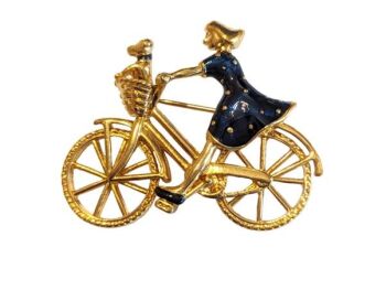 Vintage Cabouchon brooch with gold plating and blue enamel.