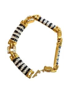 Vintage Cabouchon gold plated Zabra bracelet with high quality Austrian crystals and black enamel. Size medium.