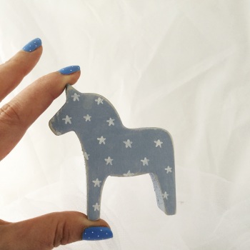 mini horse stars on blue background