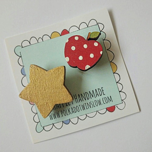 Gold star and apple brooch duo
