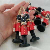 9cm hanging nutcracker style peg person, red