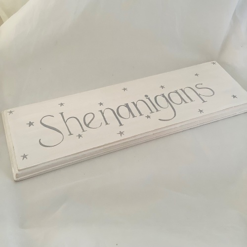 Sign ‘shenanigans’ warm white with grey stars