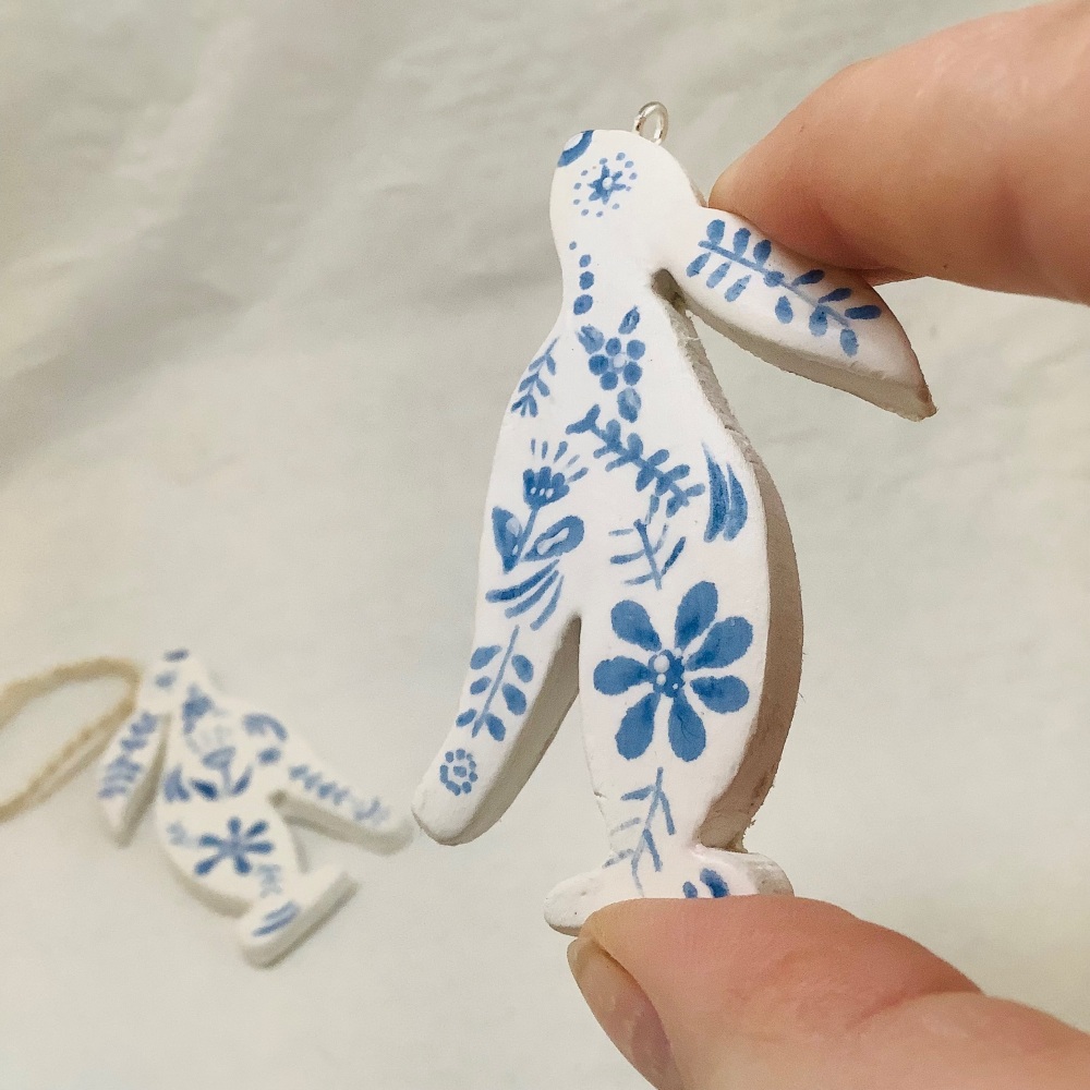 Hare dangle-blue and white- left facing