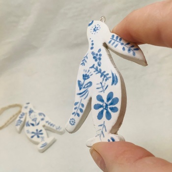 Hare dangle-blue and white- left facing