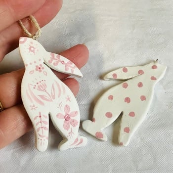 Hare dangle-pink and white- left facing