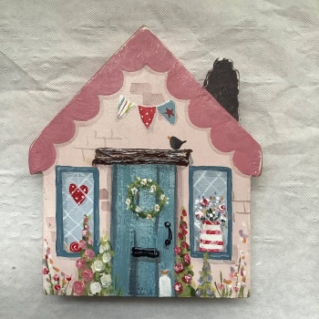 A small house -pink roof