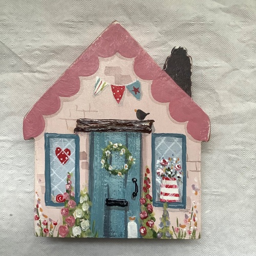 A small house -pink roof