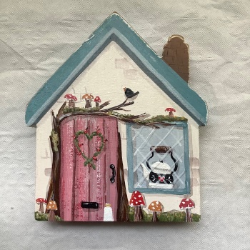 A small house -duck egg roof