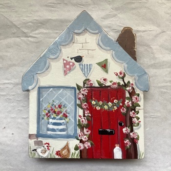 A small house -blue roof