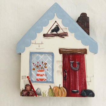A small house - blue roof