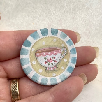 Pin - teacup green background