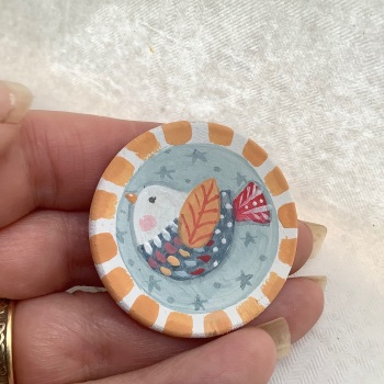 Pin - bird, blue background
