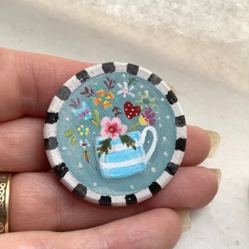 Pin - flowers in a mug, teal background