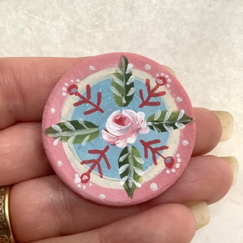 Pin - rose, teal and pink background